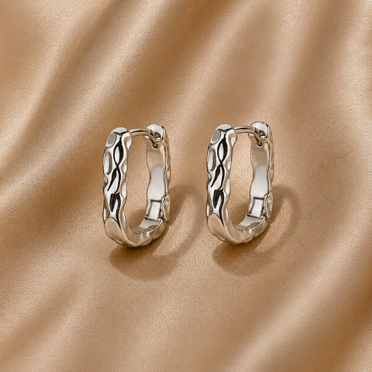 Boucles d'oreilles créoles tressées en argent Nerea